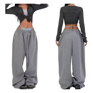 Front and back view of oversized grey street dance sweatpants for women style now