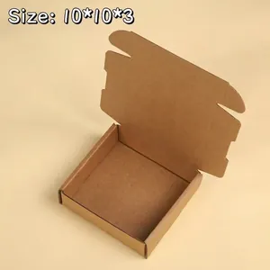 Macro detail of a small square brown kraft paper airplane box for gift packaging