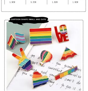 Detailed view of colorful rainbow enamel pins for creative backpack accessories