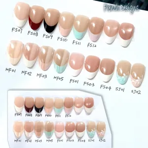 Detailed display of various French design press-on nail styles featuring almond shapes and floral art