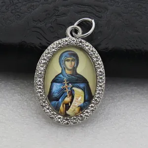 Vintage oval religious icon pendant with micro-inlaid rhinestones and silver finish