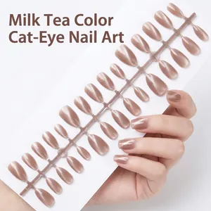 Nude milk tea cat eye press-on nails with almond shape design.