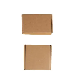 Durable kraft paper shipping boxes in rectangular and square shapes for packaging.