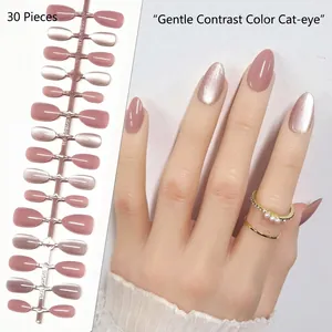Close-up detail of almond cat-eye press-on nails set showing 30 pieces and wear effect