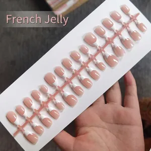 Detailed view of realistic short almond wearable nail patches in French jelly nude pink