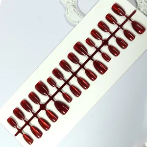 High-gloss metallic burgundy press-on nails detail set showing various sizes.