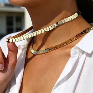 Minimalist gold-plated moon semi-circle link necklace for women, lifestyle model shot