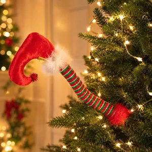 Festive elf leg Christmas tree decoration with striped pattern and red velvet boot.