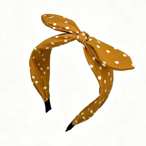 Vintage mustard yellow polka dot headband with a stylish bow knot for daily wear