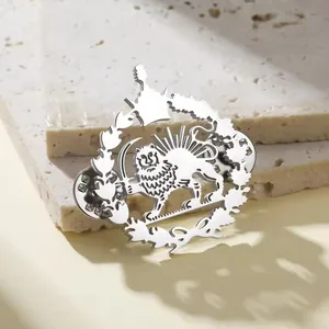 Detail showing the intricate cut-out design of the 304 stainless steel lion brooch