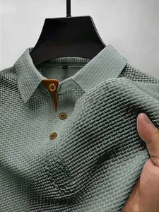 Close-up view of breathable ice silk mesh fabric on a men's polo shirt collar.