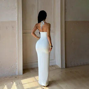 Elegant sexy white halter neck backless evening maxi dress with slim fit silhouette