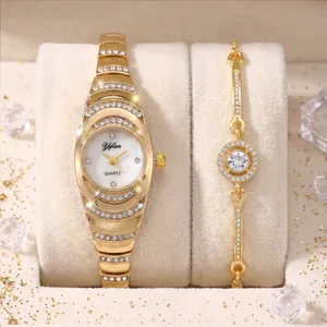 Detail shot of elegant luxury gold quartz watch and rhinestone bracelet jewelry set