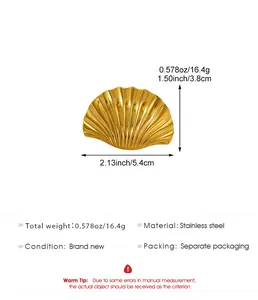 Detailed view of golden stainless steel shell brooch with size and weight specs