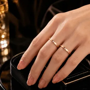 Minimalist rose gold stainless steel ring with a single small diamond for women and girls