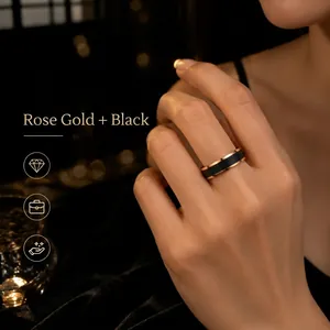 Elegant rose gold and black stainless steel ring for women in luxury minimalist style