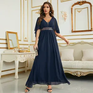Elegant navy blue V-neck flutter sleeve chiffon evening gown with sequined waist.