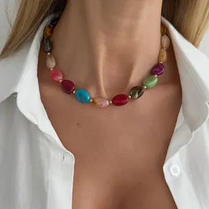 Bohemian colorful irregular resin bead necklace with gold spacers on model