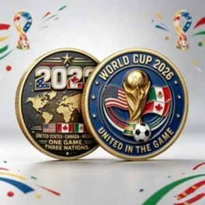 Commemorative gold coin for World Cup 2026 with trophy and national flags detail