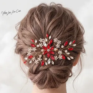 Vintage handmade bridal hair comb featuring red marquise rhinestones and gold leaf design
