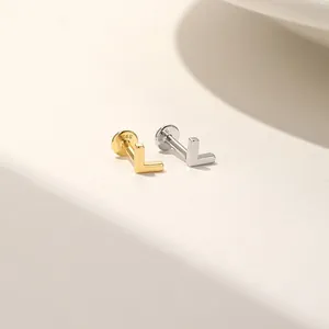 Macro view of S925 sterling silver L-shaped flat back labret piercing stud