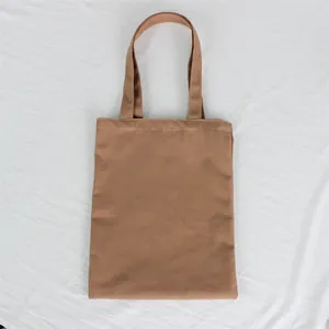 Durable plain brown canvas tote bag for shopping and DIY painting on white fabric