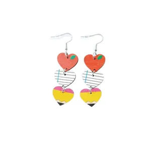 Back to school themed wooden heart earrings featuring apple, paper and pencil designs