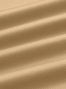 Detailed macro shot of breathable bird's eye mesh fabric for men's tactical polo
