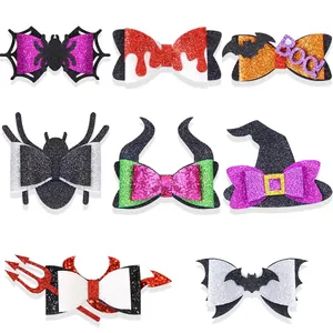 Festive Halloween pet hair clip set with glitter spider and bat bows for cats and dogs