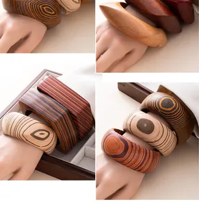 Artistic vintage wooden chunky bangle bracelets with unique natural grain patterns.