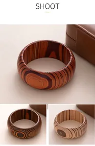 Detailed view of retro wooden bangles with natural grain patterns and textures.