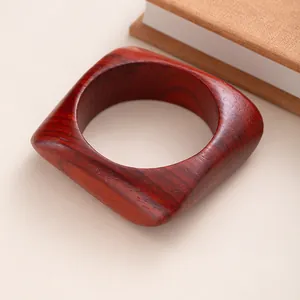 Retro square reddish-brown wooden bangle with natural grain for a niche vintage style