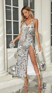 Elegant silver sequin halter neck evening gown featuring a sexy side high slit design