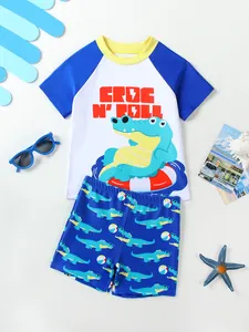 Boys' quick-dry swimwear set with cartoon crocodile print and blue sunglasses prop