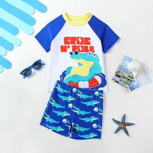 Cute boys two-piece cartoon crocodile swimwear set featuring short sleeves and shorts