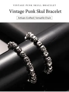 Close-up detail of vintage silver punk skull bracelet beads for men on display stand
