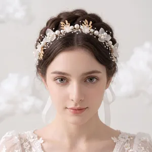 Handmade bridal headband with gold leaves, pearls and white flowers for wedding