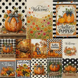 Collection of 12 autumn-themed linen garden flags with pumpkin and leaf designs