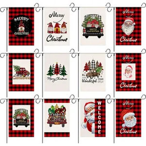 Set of assorted Christmas garden flags featuring festive gnomes and Santa designs.