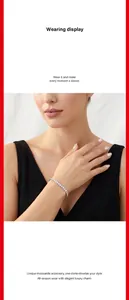Detailed close-up of a sparkling S925 silver Moissanite tennis bracelet on model