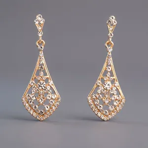 Elegant gold-colored dangle earrings with rhinestones for bridal and party wear