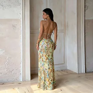 Elegant sexy backless patterned long slip dress perfect for beach resort and vacation.