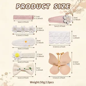 Dimensions détaillées de l'ensemble de barrettes brodées fleurs et papillons