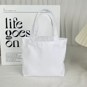 Minimalist pure white canvas lunch tote bag shown with elegant decorative background