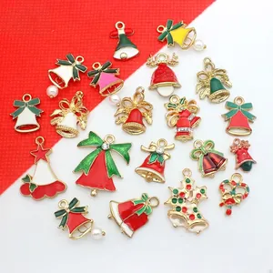 Collection of festive Christmas enamel bell and tree charms for DIY jewelry making.