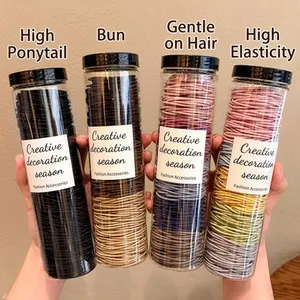 Set of 4 bottles with high elasticity hair ties in various colors for daily hair styling