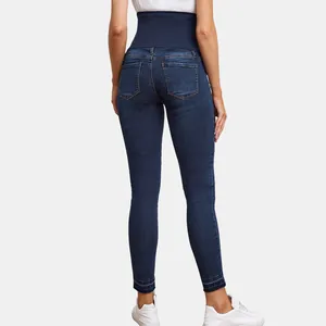 Detailed back view of high waist maternity skinny jeans featuring elastic belly support band