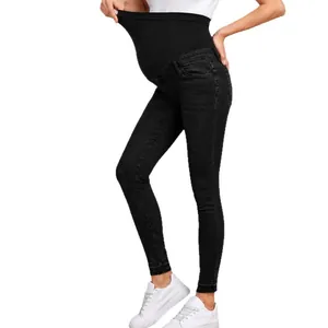 Fashionable maternity high waist over-belly skinny jeans in black stretchy denim fabric