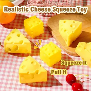 Detail view of squishy realistic cheese stress relief toy on picnic table.