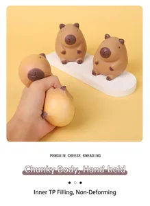 Close-up of brown capybara squishy toy being squeezed for stress relief